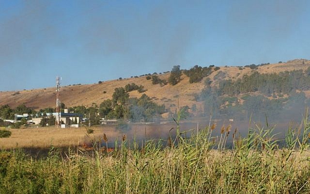 A large fire raging near Kfar Sold, caused by missiles fired from the Syrian side of the Israeli-Syrian border and hitting open areas in the Golan Heights in northern Israel on August 20, 2015. (Basel Awidat/Flash90) A large fire raging near Kfar Sold, caused by missiles fired from the Syrian side of the Israeli-Syrian border and hitting open areas in the Golan Heights in northern Israel on August 20, 2015. (Basel Awidat/Flash90)