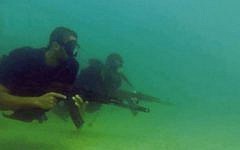 Hamas naval commandos, seen in a still image from a propaganda video released by the terror group during Israel's Operation Protective Edge, in the summer of 2014. (Screen capture)