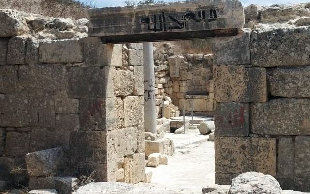 Church of St. John the Baptist at Sebastia in the West Bank, scrawled with "There is no God but Allah" in Arabic (Ilan Ben Zion/Times of Israel staff)