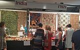 Customers browse at the India booth in the International Pavilion at the 40th annual Hutzot Hayotzer fair from August 2-15, 2015 in Jerusalem. (Zahava Presser/The Times of Israel)