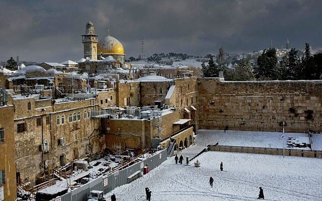 The Western Wall and the Dome of the Rock in Jerusalem, among the holiest sites respectively for Jews and Muslims, are covered in snow, December 13, 2013. (AP/Dusan Vranic, File) The Western Wall and the Dome of the Rock in Jerusalem, among the holiest sites respectively for Jews and Muslims, are covered in snow, December 13, 2013. (AP/Dusan Vranic, File)