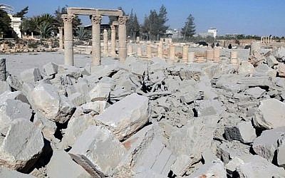 This undated file photo released Tuesday, Aug. 25, 2015 on a social media site used by Islamic State militants, which has been verified and is consistent with other AP reporting, shows the demolished 2,000-year-old temple of Baalshamin in Syria's ancient caravan city of Palmyra. (Islamic State social media account via AP)