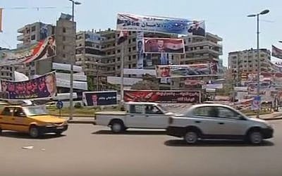 Traffic on a street in Latakia, Syria. (YouTube/Reuters)