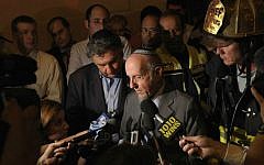 Rabbi Haskel Lookstein vowing to rebuild after a fire at Kehilath Jeshurun caused major damage to his New York synagogue, July 11, 2011.  (Michael Loccisano/Getty Images/via JTA)
