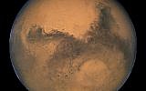 The planet Mars, as seen by the Hubble Space Telescope in 2003  (NASA, ESA, and The Hubble Heritage Team / STScI/AURA)