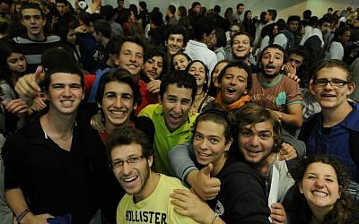 Students and volunteers from around the world celebrate MasaFest at the International Conference Center in Jerusalem, on October 29, 2012. (Louis Fisher/Flash90)