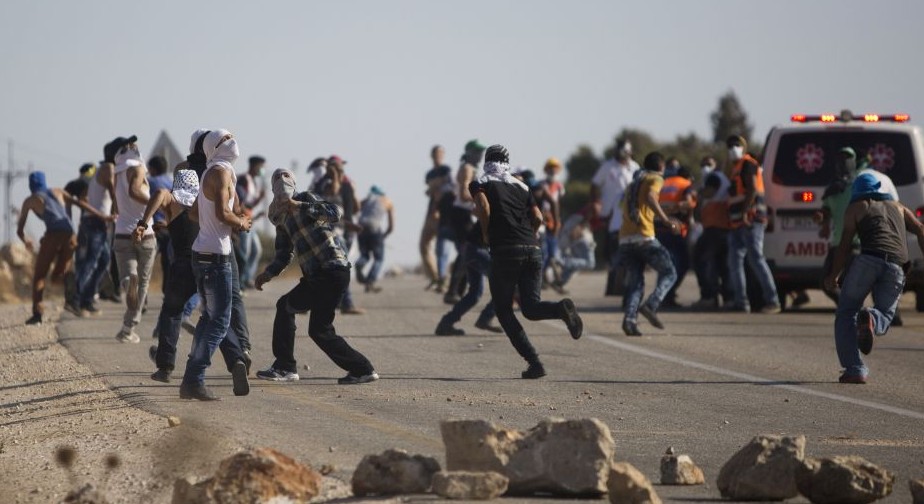 Palestinians clash with Israeli security forces after the funeral of Palestinian Saad Dawabsha, 32, in the West Bank village of Duma near Nablus on Saturday, Aug. 8, 2015. (AP Photo/Majdi Mohammed) Palestinians clash with Israeli security forces after the funeral of Palestinian Saad Dawabsha, 32, in the West Bank village of Duma near Nablus on Saturday, Aug. 8, 2015. (AP Photo/Majdi Mohammed)