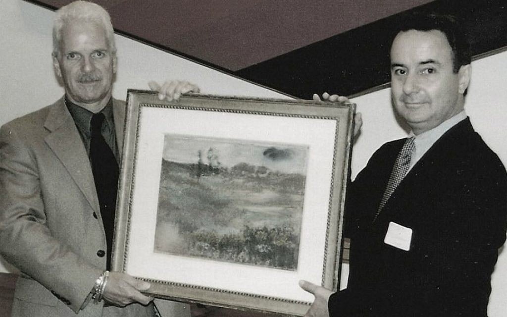 Brothers Nick and Simon Goodman holding a reclaimed Degas landscape, Chicago, 1998. (Courtesy of Goodman family) Brothers Nick and Simon Goodman holding a reclaimed Degas landscape, Chicago, 1998. (Courtesy of Goodman family)