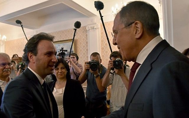 Russian Foreign Minister Sergei Lavrov (R) welcomes Syrian Opposition Council President Khaled Khoja during their meeting in Moscow on August 13, 2015. (Kirill Kudryavtsev/ AFP) Russian Foreign Minister Sergei Lavrov (R) welcomes Syrian Opposition Council President Khaled Khoja during their meeting in Moscow on August 13, 2015. (Kirill Kudryavtsev/ AFP)