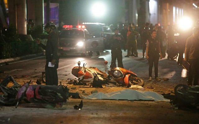 Motorcycles and debris lies on the pavement after an explosion in central Bangkok, Monday, Aug. 17, 2015. (AP Photo/Sackchai Lalit) Motorcycles and debris lies on the pavement after an explosion in central Bangkok, Monday, Aug. 17, 2015. (AP Photo/Sackchai Lalit)