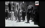 Members of the United Nations Special Committee on Palestine tour the Old City of Jerusalem in 1947 (Screenshot of newsreel footage from YouTube)