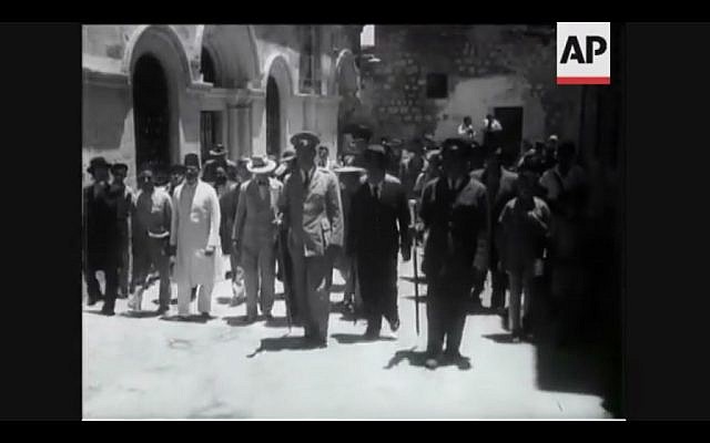 Members of the United Nations Special Committee on Palestine tour the Old City of Jerusalem in 1947 (Screenshot of newsreel footage from YouTube)