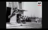 The British flag is lowered for the last time in Haifa, 1948. (Screenshot of Newsreel footage from YouTube)