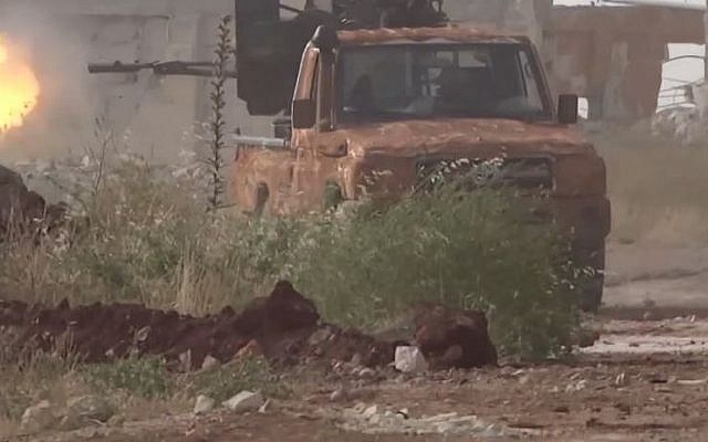 Screen capture from unconfirmed video allegedly showing Syrian rebels fighting in Ariha. (YouTube/GlobalLeaks News) Screen capture from unconfirmed video allegedly showing Syrian rebels fighting in Ariha. (YouTube/GlobalLeaks News)