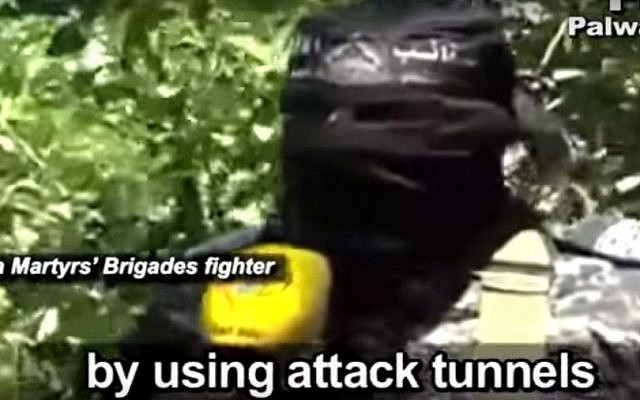 An al-Aqsa Martyrs' Brigade gunman shows off a new tunnel into Israel during a program aired on Iranian and Palestinian TV in June 2015. (screen capture: YouTube) An al-Aqsa Martyrs' Brigade gunman shows off a new tunnel into Israel during a program aired on Iranian and Palestinian TV in June 2015. (screen capture: YouTube)