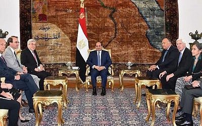 Egyptian President Abdelfattah El Sissi, center, meeting a six-person delegation from the American Jewish Committee, July 2015. (JTA/Courtesy of Ken Bandler)