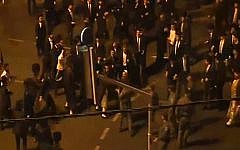 Ultra-Orthodox men clash with police in Jerusalem during an August 14, 2015, protest against the opening of the Yes Planet cinema complex on Shabbat. (screen capture: Channel 2)
