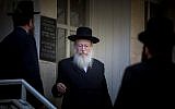 UTJ's Yaakov Litzman leaves a session of his United Torah Judaism party's Council of Torah Sages in Jerusalem on August 27, 2015. (Yonatan Sindel/Flash90)