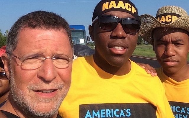 Rabbi M. Bruce Lustig, senior rabbi of Washington Hebrew Congregation, marching with NAACP supporters in Selma, Alabama, on Aug. 1. (Courtesy: Rabbi M. Bruce Lustig/JTA) Rabbi M. Bruce Lustig, senior rabbi of Washington Hebrew Congregation, marching with NAACP supporters in Selma, Alabama, on Aug. 1. (Courtesy: Rabbi M. Bruce Lustig/JTA)