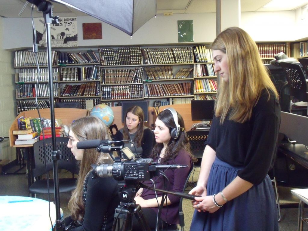 Students from Yeshiva University High School for Girls filming an interview for 'Names, Not Numbers.' (Names, Not Numbers) Students from Yeshiva University High School for Girls filming an interview for 'Names, Not Numbers.' (Names, Not Numbers)