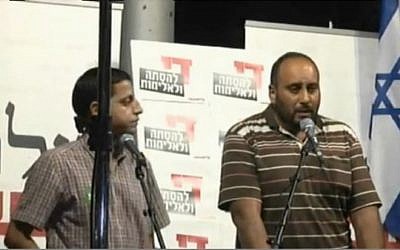 Nasser Dawabsha, uncle of slain baby Ali Dawabsha, speaks at a rally in Tel Aviv on Saturday, August 1 2015. (Screen capture Ynet)