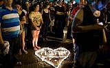 Israelis take part at a vigil in remembrance of Shira Banki at Zion Square in Jerusalem on August 2, 2015 (Yonatan Sindel/Flash90)