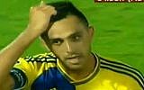 Eran Zahavi gestures after Maccabi Tel Aviv draws 1-1 with FC Basel at the Bloomfield Stadium and goes through to the next round of the UEFA Champions League,  on August 25, 2015. (screen capture: Channel 2)