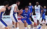Italy's small forward Alessandro Gentile (C) dribbles during the round of 16 basketball match between Israel and Italy at the EuroBasket 2015 in Lille, northern France, on September 13, 2015.  (AFP PHOTO/EMMANUEL DUNAND)
