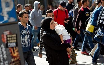 Migrants walk to a temporary shelter upon their arrival in Munich from Budapest on September 12, 2015.   (Sven Hoppe/DPA/AFP)