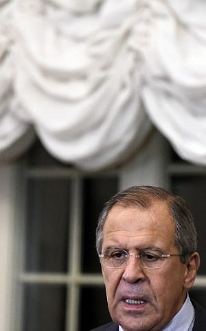 Russian Foreign Minister Sergei Lavrov addresses the media after a meeting with his French, German and Ukrainian couterparts at the foreign ministry's Villa Borsig at lake Tegel in Berlin on September 12, 2015. (Tobias Schwarz/AFP)