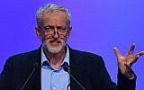 British opposition Labour party leader Jeremy Corbyn gestures as he speaks at the Trades Union Congress (TUC) in Brighton, south-east England, on September 15, 2015. (AFP PHOTO / BEN STANSALL)