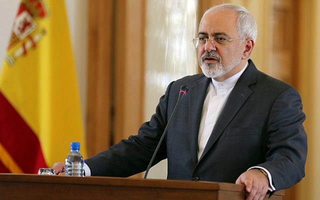 Iranian Foreign Minister Mohammad Javad Zarif speaks during a joint press conference with his Spanish counterpart Jose Garcia-Margallo (unseen) on September 7, 2015 in the Iranian capital, Tehran. (AFP PHOTO / ATTA KENARE)