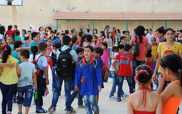 A handout picture released by the Syrian Arab News Agency (SANA) on September 13, 2015 shows Syrian children gathering in a playground on the first day of the new school year in the capital Damascus. The Organizarion of Islamic Cooperation called on the UN to create a peacekeeping force that would stem the surge of Syrian refugees. (Ho/SANA/AFP) A handout picture released by the Syrian Arab News Agency (SANA) on September 13, 2015 shows Syrian children gathering in a playground on the first day of the new school year in the capital Damascus. The Organizarion of Islamic Cooperation called on the UN to create a peacekeeping force that would stem the surge of Syrian refugees. (Ho/SANA/AFP)