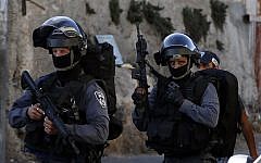 Israeli Border Police patrol a street in Jabel Mukaber after clashes in the East Jerusalem neighborhood on September 18, 2015. (AFP/Ahmad Gharabli)