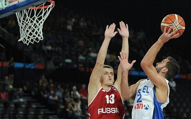 Israel's Yogev Ohayon (R) vies with Russia's Dmitry Khvostov (L) during the group A qualification basketball match between Israel and Russia at the EuroBasket 2015 in Montpellier on September 5, 2015. (AFP Photo/Sylvain Thomas) Israel's Yogev Ohayon (R) vies with Russia's Dmitry Khvostov (L) during the group A qualification basketball match between Israel and Russia at the EuroBasket 2015 in Montpellier on September 5, 2015. (AFP Photo/Sylvain Thomas)