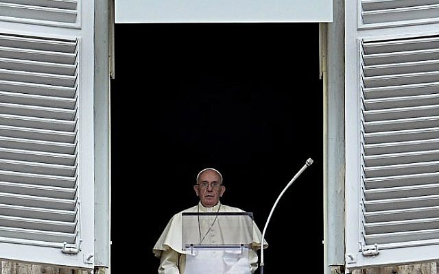 Pope Francis delivers his speech to the faithful from the window of his apartment during his Sunday Angelus prayer in St. Peter's Square at the Vatican on September 13, 2015. (AFP Photo/Andreas Solaro) Pope Francis delivers his speech to the faithful from the window of his apartment during his Sunday Angelus prayer in St. Peter's Square at the Vatican on September 13, 2015. (AFP Photo/Andreas Solaro)