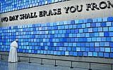 Pope Francis visits the 9/11 Memorial Museum in New York City on September 25, 2015 and prays at "Trying to Remember the Color of the Sky on That September Morning" by Spencer Finch. Reposed behind this blue wall are the remains of many who perished at the World Trade Center site on September 11, 2001 (AFP/POOL/Susan Watts)