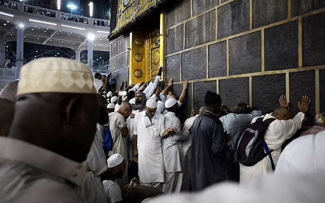 Muslim pilgrims touch Islam's holiest shrine, the Kaaba, at the Grand Mosque in Saudi Arabia's holy Muslim city of Mecca late on September 26, 2015 (AFP PHOTO/MOHAMMED AL-SHAIKH) Muslim pilgrims touch Islam's holiest shrine, the Kaaba, at the Grand Mosque in Saudi Arabia's holy Muslim city of Mecca late on September 26, 2015 (AFP PHOTO/MOHAMMED AL-SHAIKH)