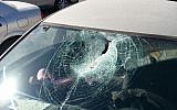 Damage to a car pelted with stones outside Jerusalem on September 20, 2015. (Courtesy)