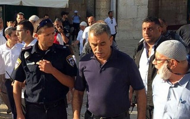 MK Jamal Zahalka (center) on the Temple Mount in the Old City of Jerusalem on Tuesday, September 29 2015 (courtesy Joint List) MK Jamal Zahalka (center) on the Temple Mount in the Old City of Jerusalem on Tuesday, September 29 2015 (courtesy Joint List)