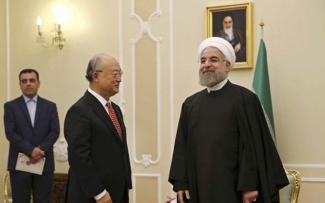 Iranian President Hassan Rouhani welcomes UN nuclear chief Yukiya Amano for their meeting in Tehran, Iran, Sunday, Sept. 20, 2015. (AP Photo/Vahid Salemi) Iranian President Hassan Rouhani welcomes UN nuclear chief Yukiya Amano for their meeting in Tehran, Iran, Sunday, Sept. 20, 2015. (AP Photo/Vahid Salemi)