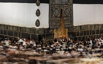 In this Monday, Sept. 21, 2015 photo taken with a slow shutter speed, Muslim pilgrims circle the Kaaba, the cubic building at the Grand Mosque in the Muslim holy city of Mecca, while performing Tawaf, an anti-clockwise movement around the Kaaba and one of the main rites of the annual pilgrimage, known as Hajj, in Saudi Arabia. (AP Photo/Mosa'ab Elshamy)