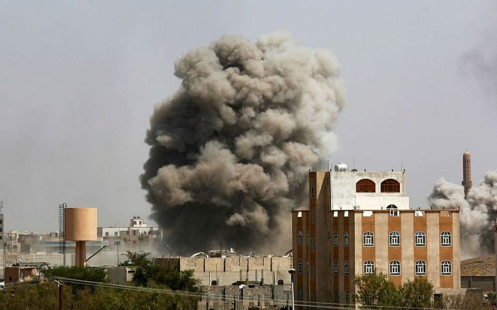 Smoke rises after a Saudi-led airstrike hits an army academy in Sanaa, Yemen, Sunday, Sept. 20, 2015. (AP Photo/Hani Mohammed)