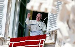 Pope Francis waves to faithful as he arrives to recite the Angelus noon prayer from his studio window overlooking St. Peter's Square at the Vatican, Sunday, Sept. 6, 2015. (AP Photo/Riccardo De Luca)