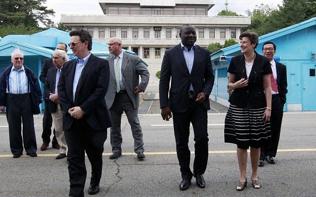 Comprehensive Nuclear Test Ban Treaty Organization Executive Secretary Lassina Zerbo, third from right, and the Eminent Persons Group members visit the border village of Panmunjom that separates the two Koreas in South Korea, June 26, 2015. (AP Photo/Ahn Young-joon) Comprehensive Nuclear Test Ban Treaty Organization Executive Secretary Lassina Zerbo, third from right, and the Eminent Persons Group members visit the border village of Panmunjom that separates the two Koreas in South Korea, June 26, 2015. (AP Photo/Ahn Young-joon)