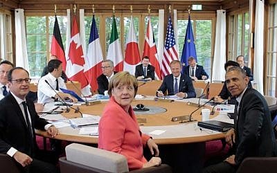 From bottom clockwise, German Chancellor Angela Merkel, French President Francois Hollande, British Prime Minister David Cameron, Italian Prime Minister Matteo Renzi, EU Commission President Jean-Claude Juncker, European Council President Donald Tusk, Japanese Prime Minister Shinzo Abe, Canadian Prime Minister Stephen Harper and US President Barack Obama at the G-7 summit in Schloss Elmau hotel near Garmisch-Partenkirchen, southern Germany, Monday, June 8, 2015. (Markus Schreiber/AP)