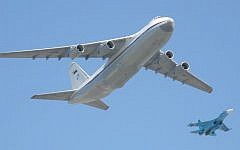 A Russian Antonov An-124 "Condor", flanked by a Sukhoi Su-27 fighter jet (CC BY-SA, Flickr Dmitry Terekhov)