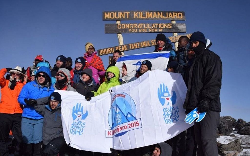 The Save a Child‘s Heart team on the summit of Mt Kilimanjaro on September 3, 2015. (courtesy Randi Weiss/SACH) The Save a Child‘s Heart team on the summit of Mt Kilimanjaro on September 3, 2015. (courtesy Randi Weiss/SACH)