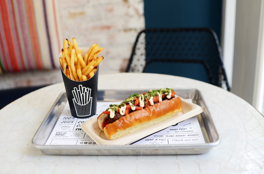 A pesto “meatball” sandwich with a side of air-baked french fries at by CHLOE. (Mikey Pozarik/Paperwhite Studio / JTA) A pesto “meatball” sandwich with a side of air-baked french fries at by CHLOE. (Mikey Pozarik/Paperwhite Studio / JTA)