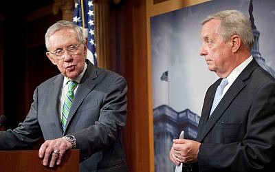 In this Sept. 10, 2015 file photo, Senate Minority Leader Harry Reid (D-Nevada), and Senate Minority Whip Richard Durbin (D-Illinois), participate in a news conference on Capitol Hill in Washington. (AP Photo/Pablo Martinez Monsivais, File)
